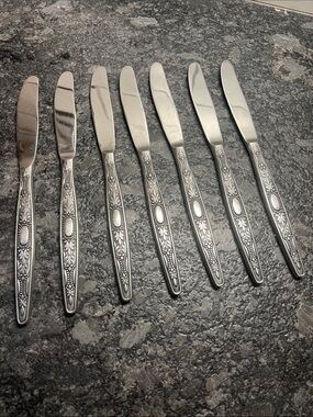 Vintage Stainless Steel Butter Knife Set of 7. Floral Pattern Silver Antiqued